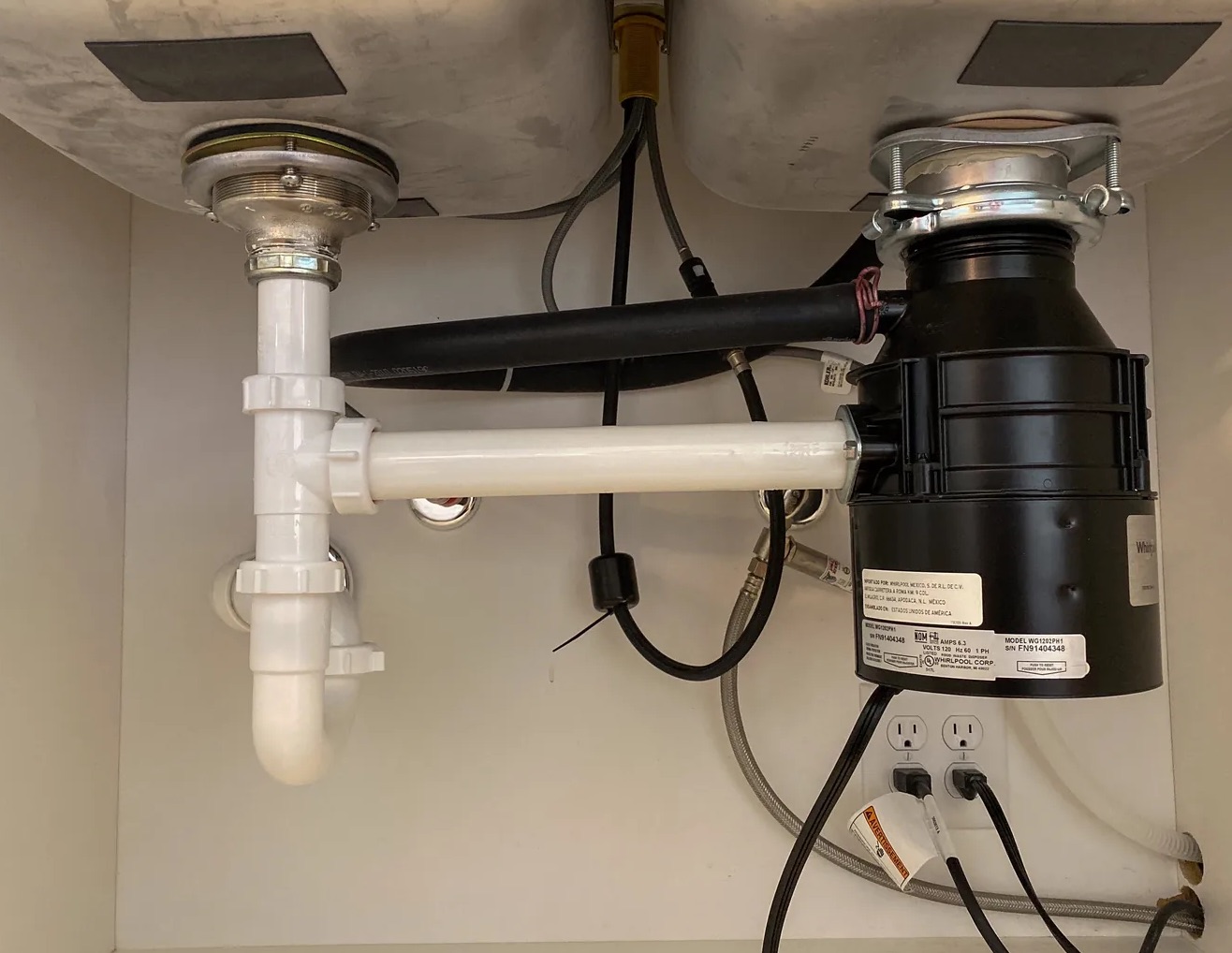 Leaky Garbage Disposal Cleanup in Portland, OR